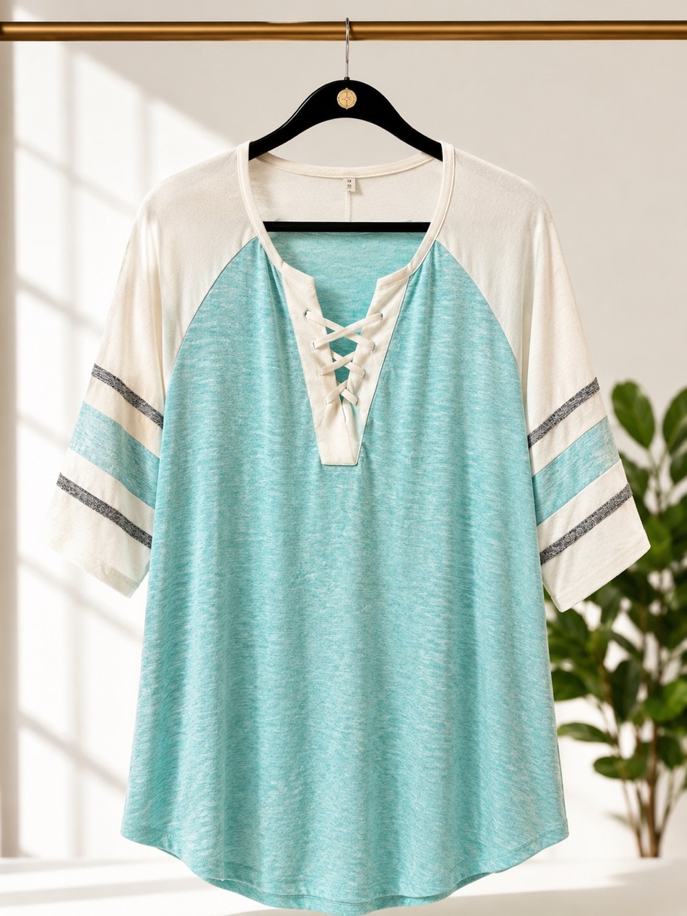 Women’s Lace-Up Raglan Top in Aqua and Cream

Says 5xl but fits like a 2xl